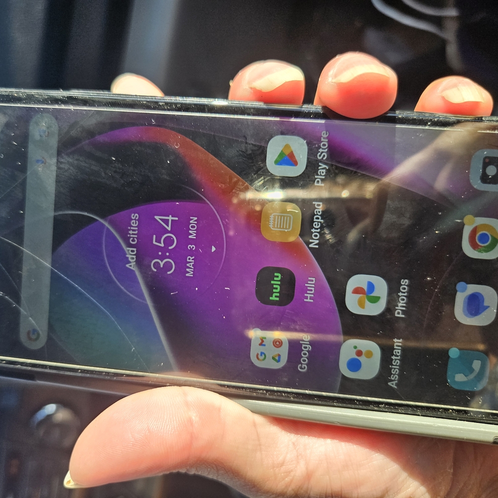 Sleek Black and Silver Smartphone with Full-Screen Display